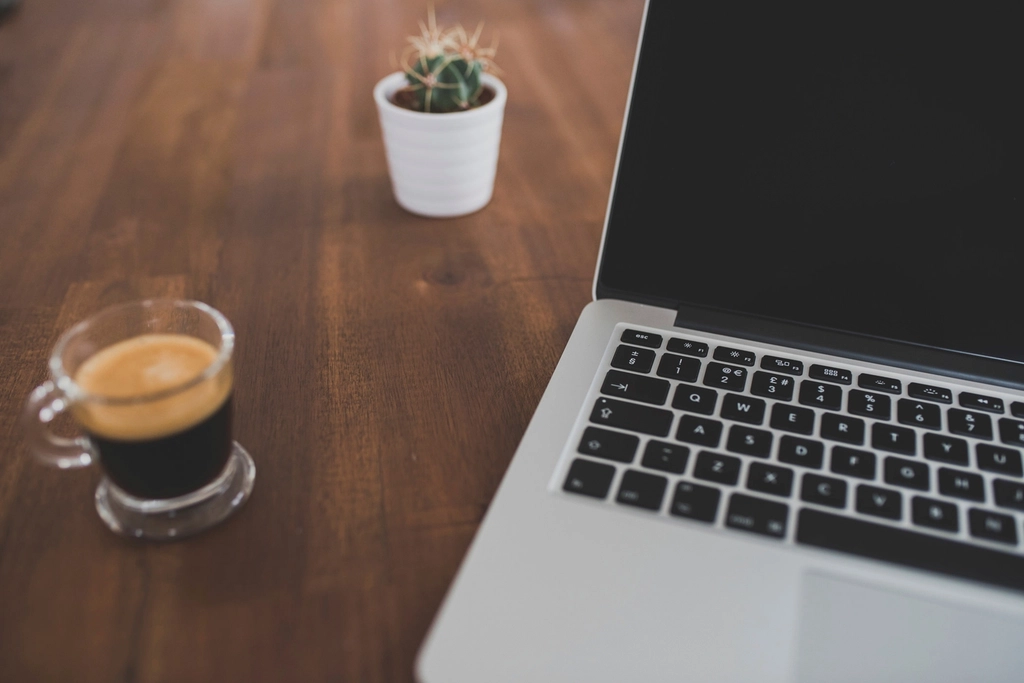Modern desk workspace used for website hosting management and support operations