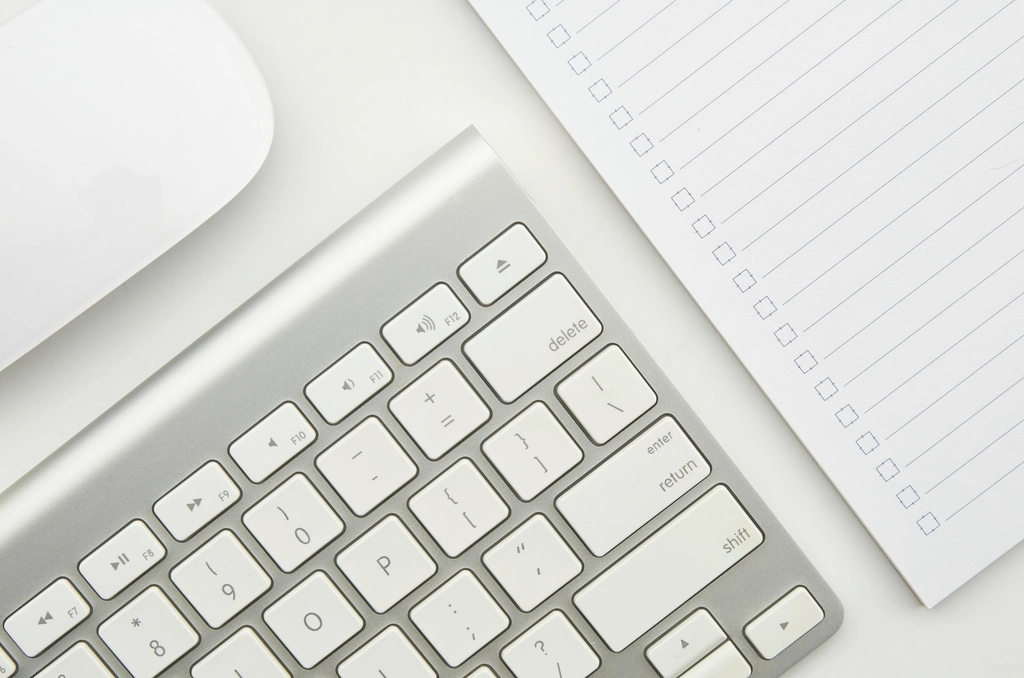 Office workstation with keyboard and monitor for website and email administration